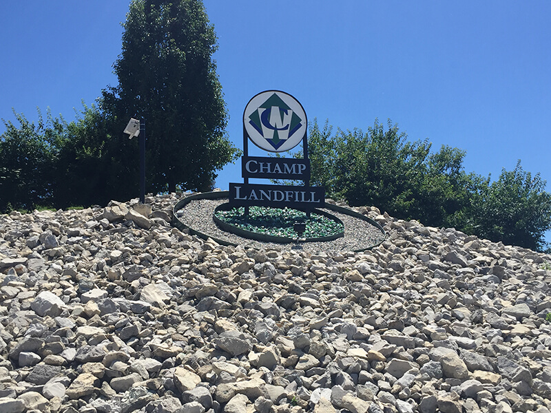 Picture of the Champ Landfill sign outside of their operation area.